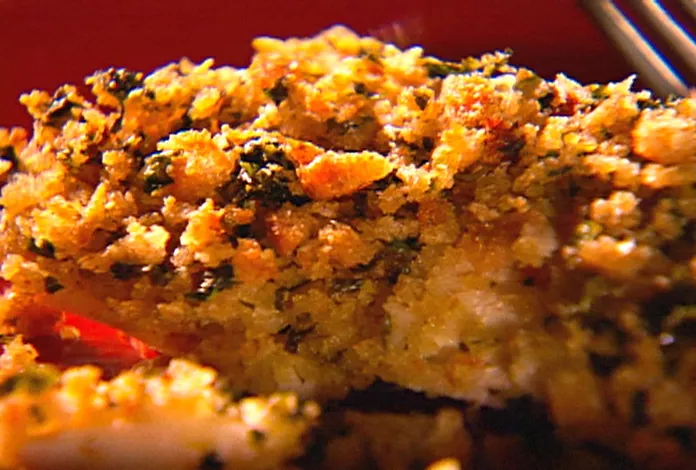 Baked seabass with homemade garlic butter and herb bread crumb topping Recipe | Food Network UK