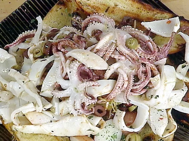 Barbecued calamari on a bed of shaved fennel Recipe | Food Network UK