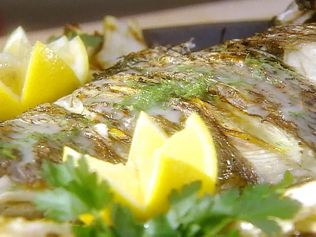 Barbecued whole red snapper with sea salt and fresh oregano mix and black olive & feta cheese relish