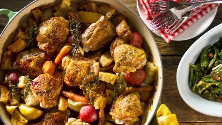 Crispy Lemon Chicken Thighs with Potatoes and Baby Carrots Recipe | Food Network UK