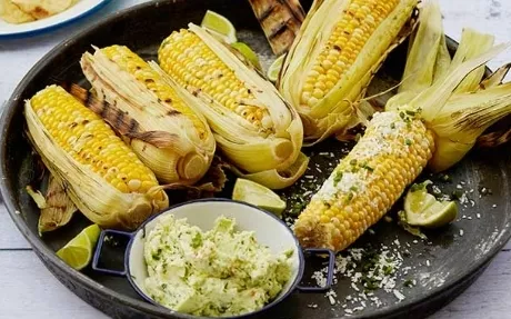 Grilled Corn on the Cob with Garlic Butter, Fresh Lime and Cotija Cheese Recipe | Food Network UK