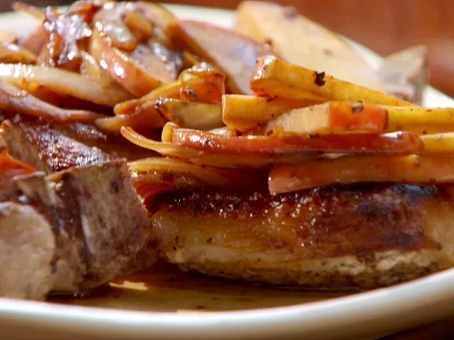 Mashed sweet potatoes, pork chop with cider gravy, sauteed apples and onions Recipe | Food Network U