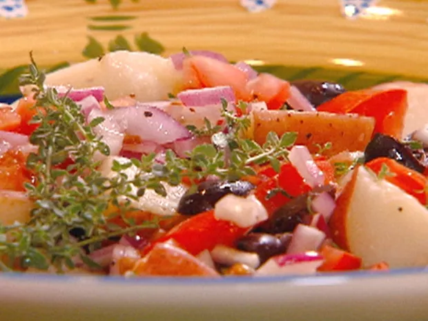 Potatoes with onions, olives and tomatoes Recipe | Food Network UK