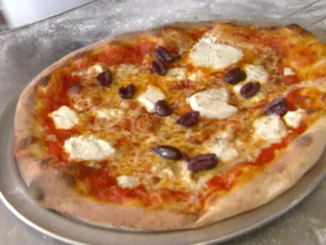 Roasted red pepper-tomato pizza with goat cheese, basil and red chilli oil Recipe | Food Network UK