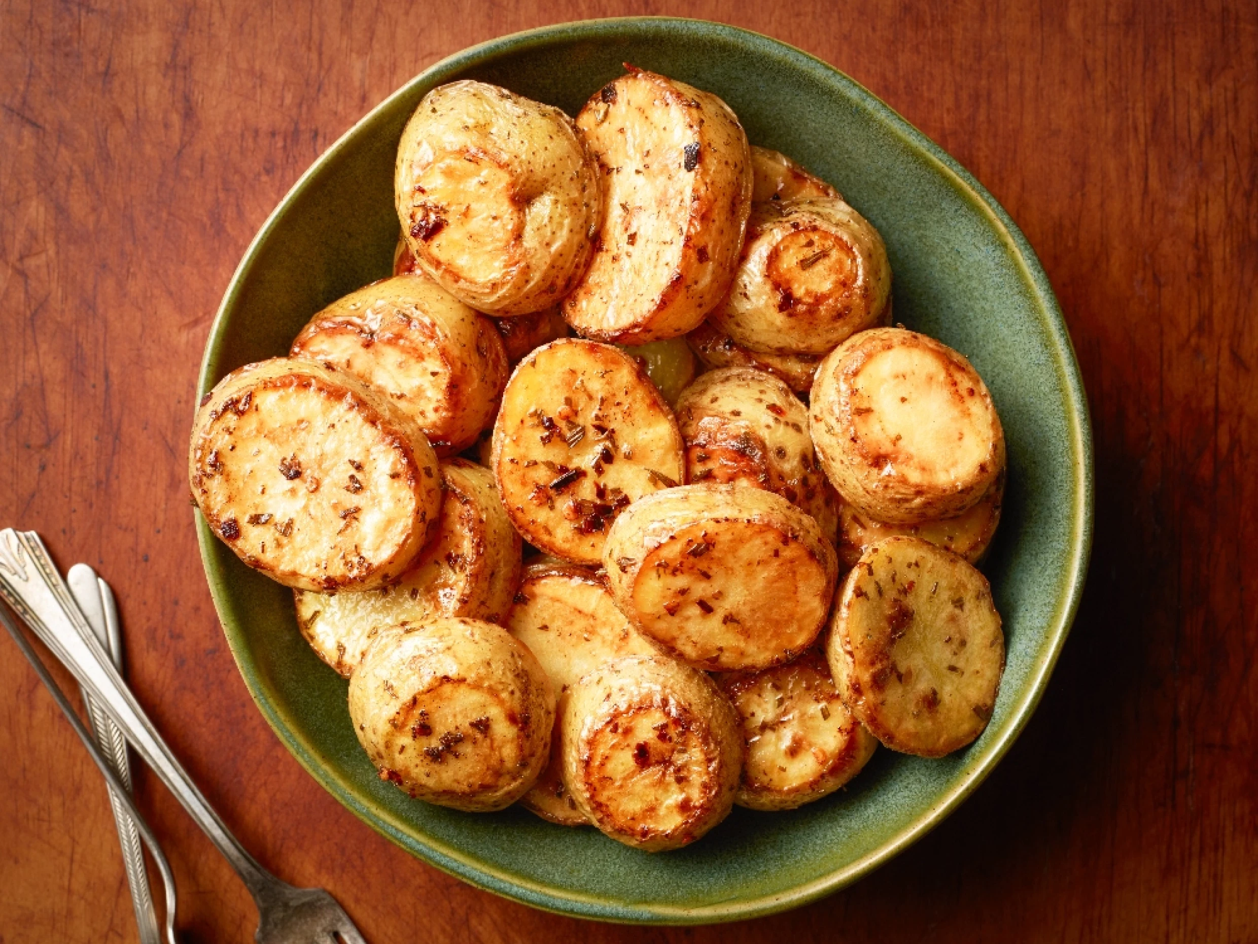 golden crushed potatoes in a bowl