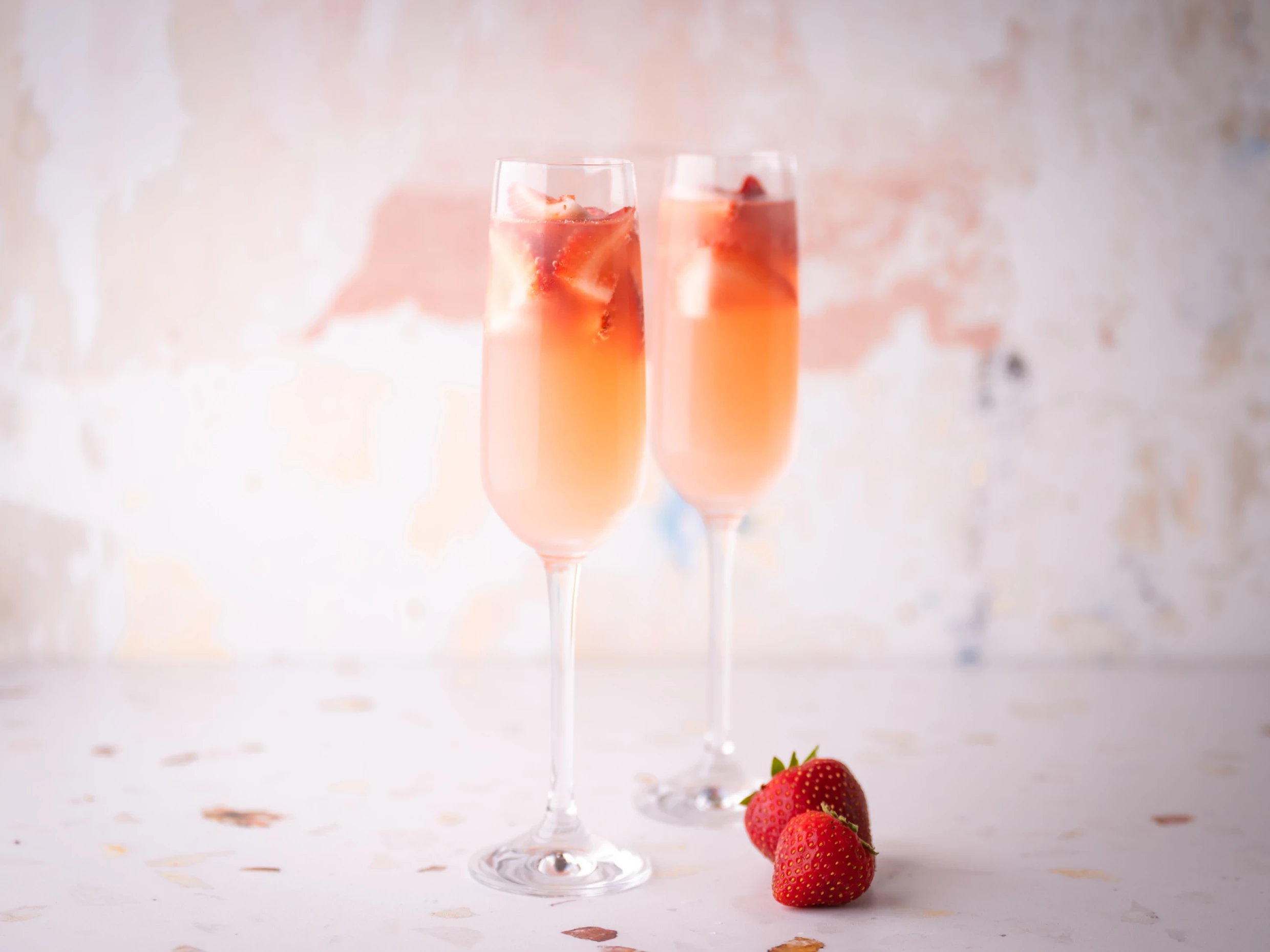 prosecco cocktail with strawberry garnish