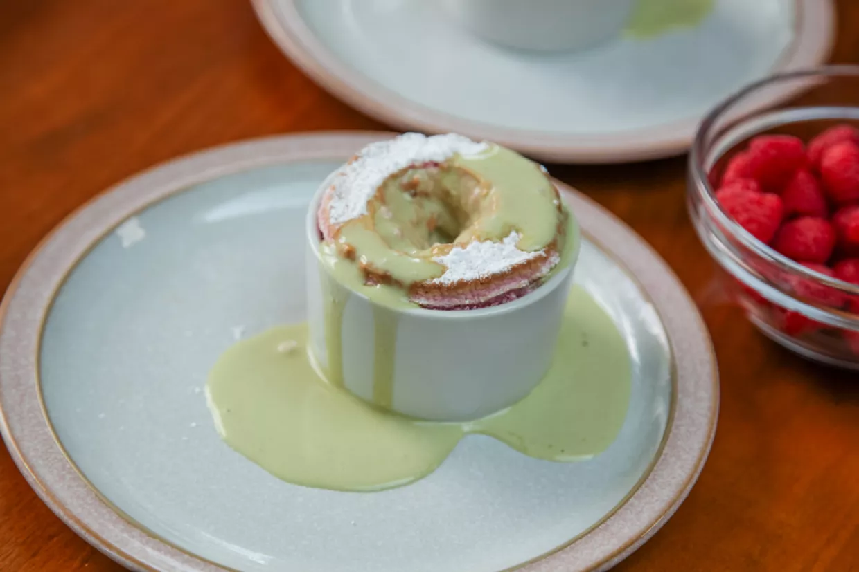 Raspberry Souffle with Pistachio Custard Recipe | Food Network UK